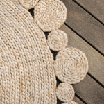 Handcrafted Natural Round Scalloped Jute Rug by CG Hunter - Eco-Friendly and Elegant Home Decor