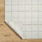Ishaq Solid and Border Ivory Area Rug - Image 6