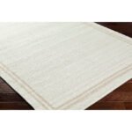 Janmichael Solid and Border Ivory Area Rug - Image 6
