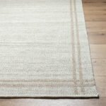 Janmichael Solid and Border Ivory Area Rug - Image 3