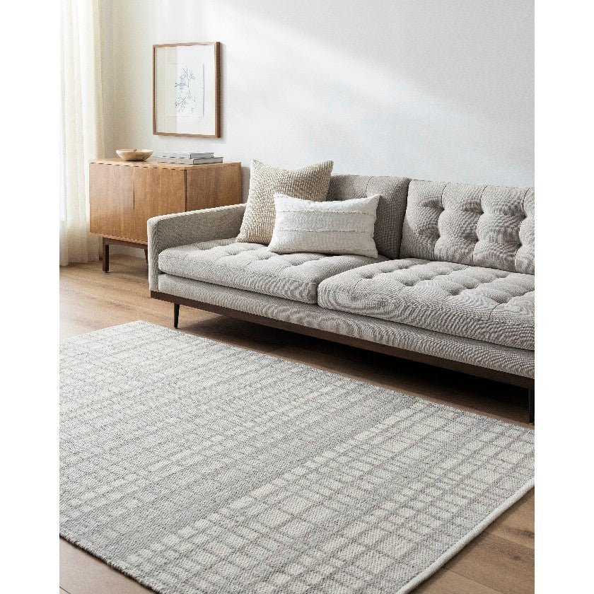 AAAB8721-576-roomscene_201_e81c3127-e104-4c7d-9a86-08e6caa5f631-1 Ishaq Solid and Border Light Grey Area Rug - Image 1
