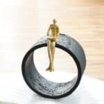 Black & Gold Circular Focused Sitting Figure Sculpture - Image 4