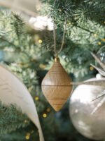Set of 6 Hand-Carved Natural Mango Wood Ornaments with Brass Topper and Jute Hanger - Image 3