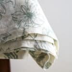 CG Hunter Handcrafted Grey and Green Lilies Linen Tablecloth - Elegant Durable Design for Dining Decor - Image 8