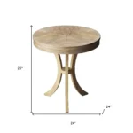 Goldoma 26 inch beige distressed round three-leg end table in a living room setting