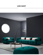 Goldoma L-shaped velvet sleeper sofa in modern living room with chaise and pull-out bed