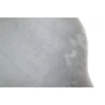 Goldoma 15 inch free form modern white marble end table with black metal base placed beside a sofa in a living room