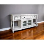 Goldoma 70 inch white solid wood TV stand with open shelving and distressed finish in a living room setting
