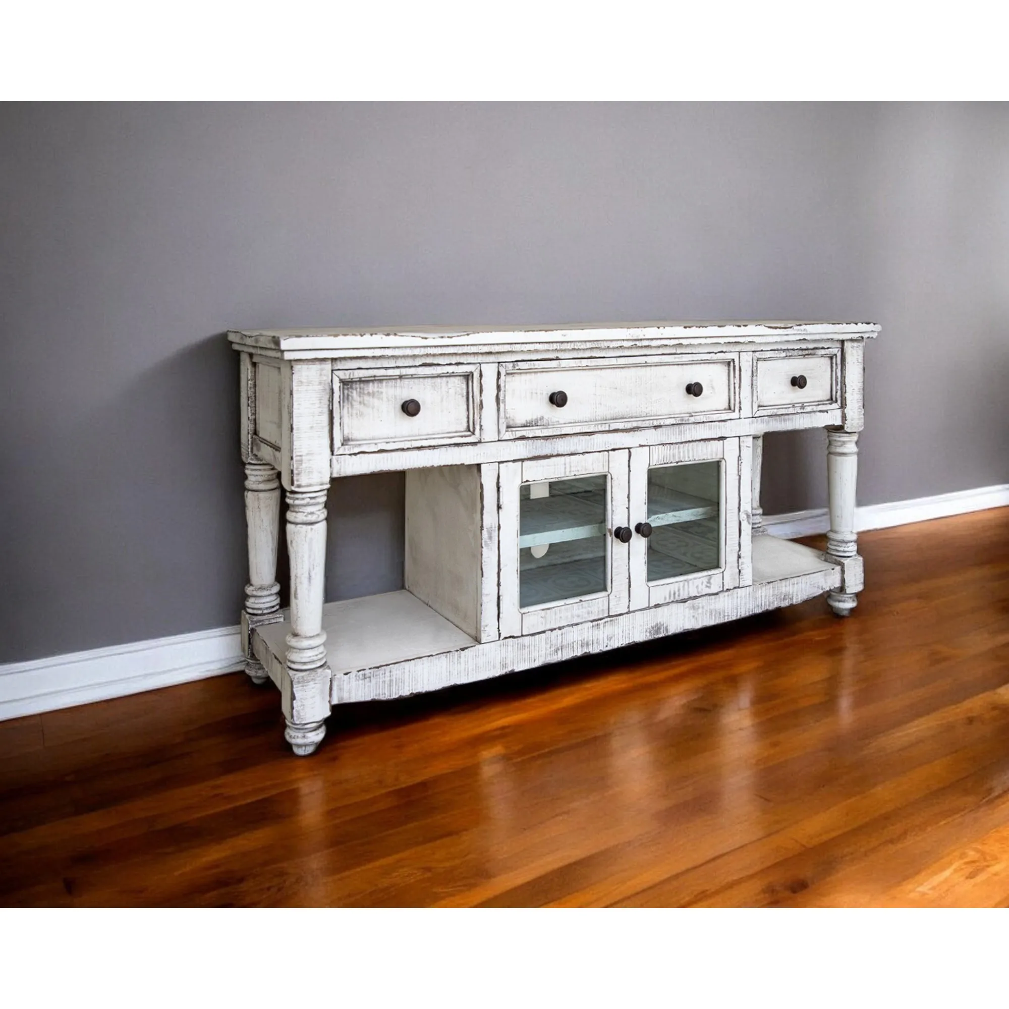 H02bbb395d66e4d32b5c59c01cb274928c.webp Goldoma 70 inch white solid wood TV stand with open shelving and distressed finish in a living room setting
