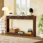 Modern console table with wavy patterned front and two storage drawers in a living room setting