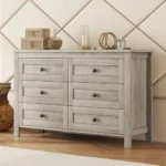 Goldoma rustic wood TV stand for TVs up to 75 inches with wavy door and storage cabinets in a mid-century modern living room