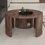Goldoma round nesting coffee table set of 2 in natural wood and walnut finish, displayed in a modern living room