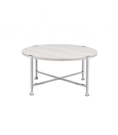 Goldoma 36-inch round coffee table with white paper veneer top and silver metal cross legs in a modern living room