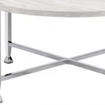 Goldoma 36-inch round coffee table with white paper veneer top and silver metal cross legs in a modern living room