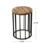 Goldoma 15 inch round solid wood outdoor side table with black metal frame on a patio