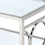 Modern coffee table with tempered glass top and steel frame in a living room