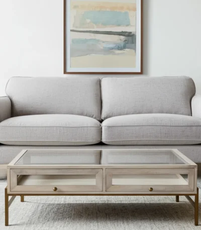 Goldoma 44 inch off-white glass top shadowbox coffee table with two drawers and gold legs in living room