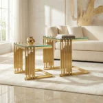 Goldoma gold coffee table set with tempered glass top and gold stainless steel frame in a modern living room