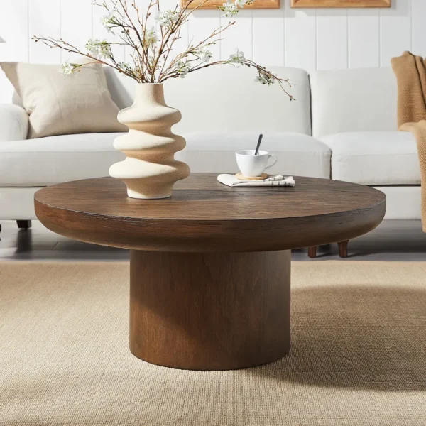Goldoma round coffee table with wood veneer top and cylindrical legs in dark brown, modern style for living room