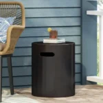 Goldoma Copper Outdoor Lightweight Concrete Side Table on patio with plants and seating