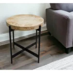 Goldoma 22-inch black and brown burl wood round end table with black metal base in a living room setting