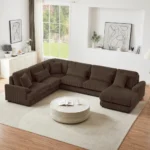 Goldoma 101.2-inch beige corduroy sectional sofa with deep seating and side pockets in a living room