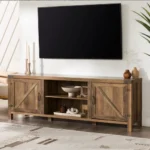 Goldoma rustic oak TV stand with double barn doors for TVs up to 80 inches in a living room