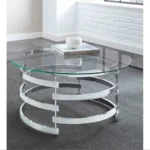 Goldoma round coffee table with chrome base and tempered glass top in modern living room