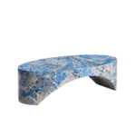 Goldoma oval blue fiberglass coffee table with marble-like finish in a modern living room
