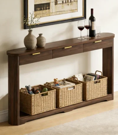 Modern console table with wavy patterned front and two storage drawers in a living room setting