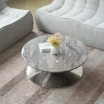 Goldoma modern marbling wood coffee table with round wood top and stainless steel base in a living room