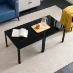 Goldoma nesting coffee table set with tempered glass top and black oak frame in modern living room