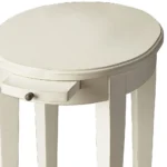 Goldoma 26 inch white oval end table with shelf in a living room setting