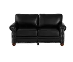 Goldoma black faux leather loveseat with memory foam cushions and wood legs in a modern living room