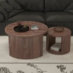 Goldoma round nesting coffee table set of 2 in natural wood and walnut finish, displayed in a modern living room