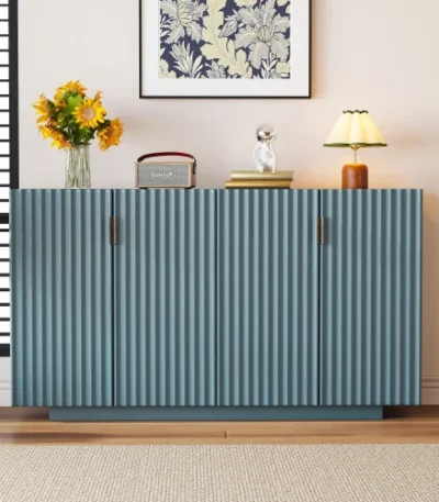 Antique blue sideboard with wave doors and vintage copper handles in a midcentury modern dining room decor
