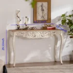 Goldoma French vintage carved distressed white console table in entryway with decor