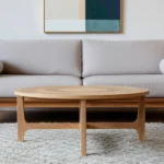 Round coffee table 39 inch natural and white distressed solid wood in a farmhouse living room