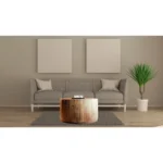 Goldoma 34-inch natural solid wood round coffee table in a modern living room setting