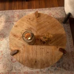 Goldoma round wood coffee table in farmhouse wabi sabi style with natural finish