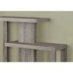 Goldoma 32-inch taupe free-form console table in living room with decorative items