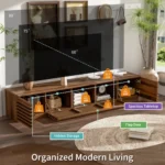 Modern wood TV stand for TVs up to 80 inches with cable management and soft-close hinges in a living room