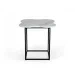 Goldoma 15 inch free form modern white marble end table with black metal base placed beside a sofa in a living room