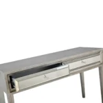 Silver mirrored console table with drawers by Goldoma in antiqued silver finish, 48 inches wide, placed in an entryway