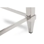 Goldoma 55-inch clear glass coffee table with silver steel frame in modern living room setting
