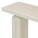 Modern acacia veneer console table in gray and black finish placed in an entryway with decorative items on top