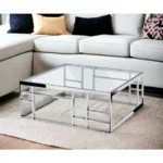 Goldoma 40-inch clear and silver glass coffee table with stainless steel frame in modern living room