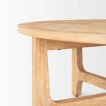 Round coffee table 39 inch natural and white distressed solid wood in a farmhouse living room
