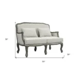 Goldoma 56-inch cream and gray linen loveseat with toss pillows in a modern living room