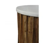 Marble round end table with brown solid wood base and ivory marble top in a living room setting